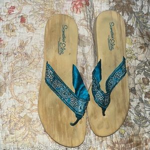 Women flip flops by skecher. Size 10